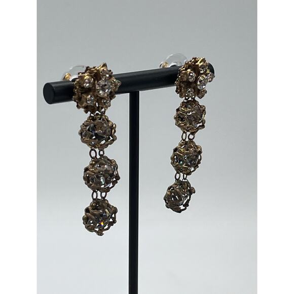 Vintage Gold-Tone Filigree Drop Rhinestone Accents
Statement Dangle Earrings - Picture 3 of 15